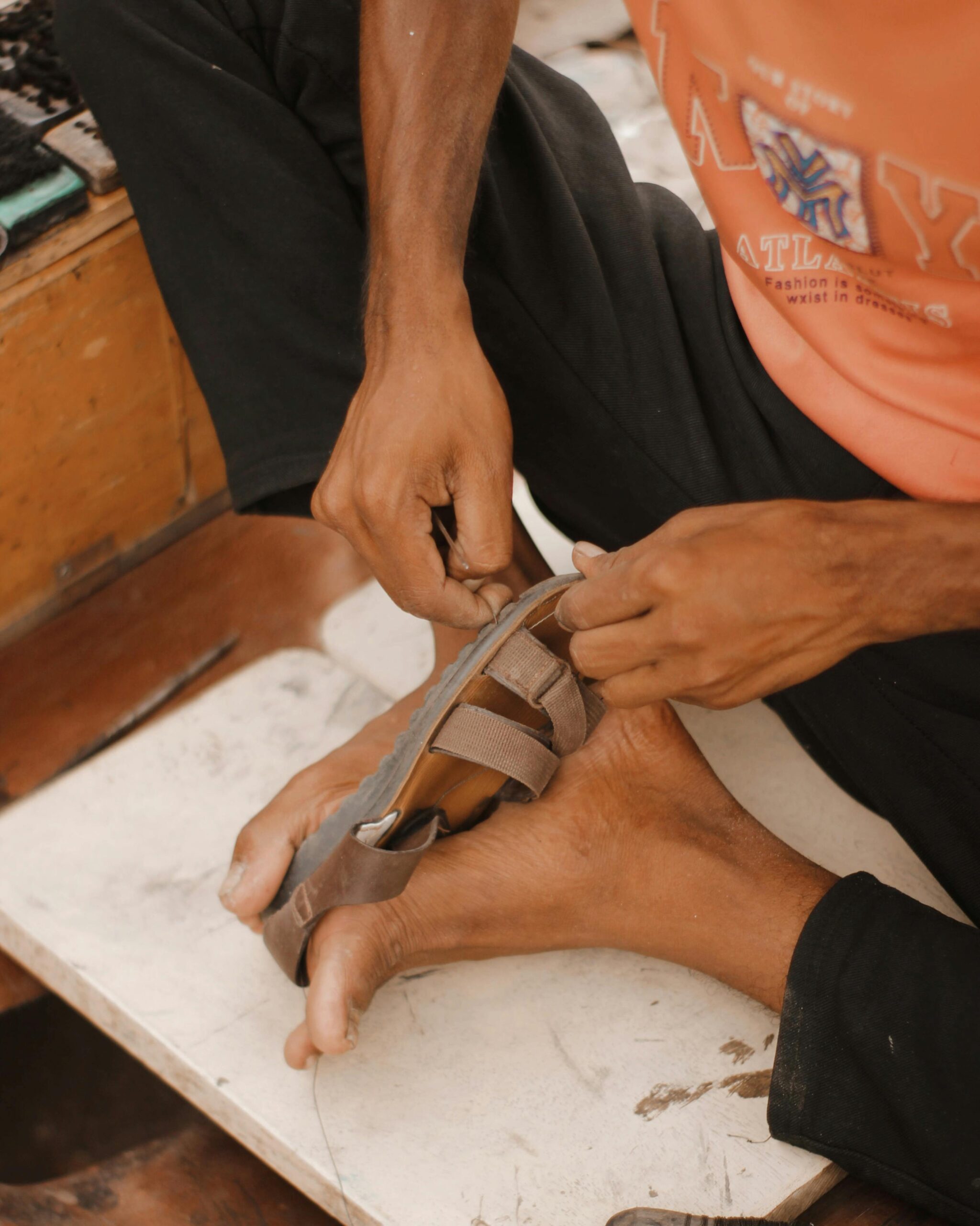 handcrafted leather sandal being crafted by Bulani